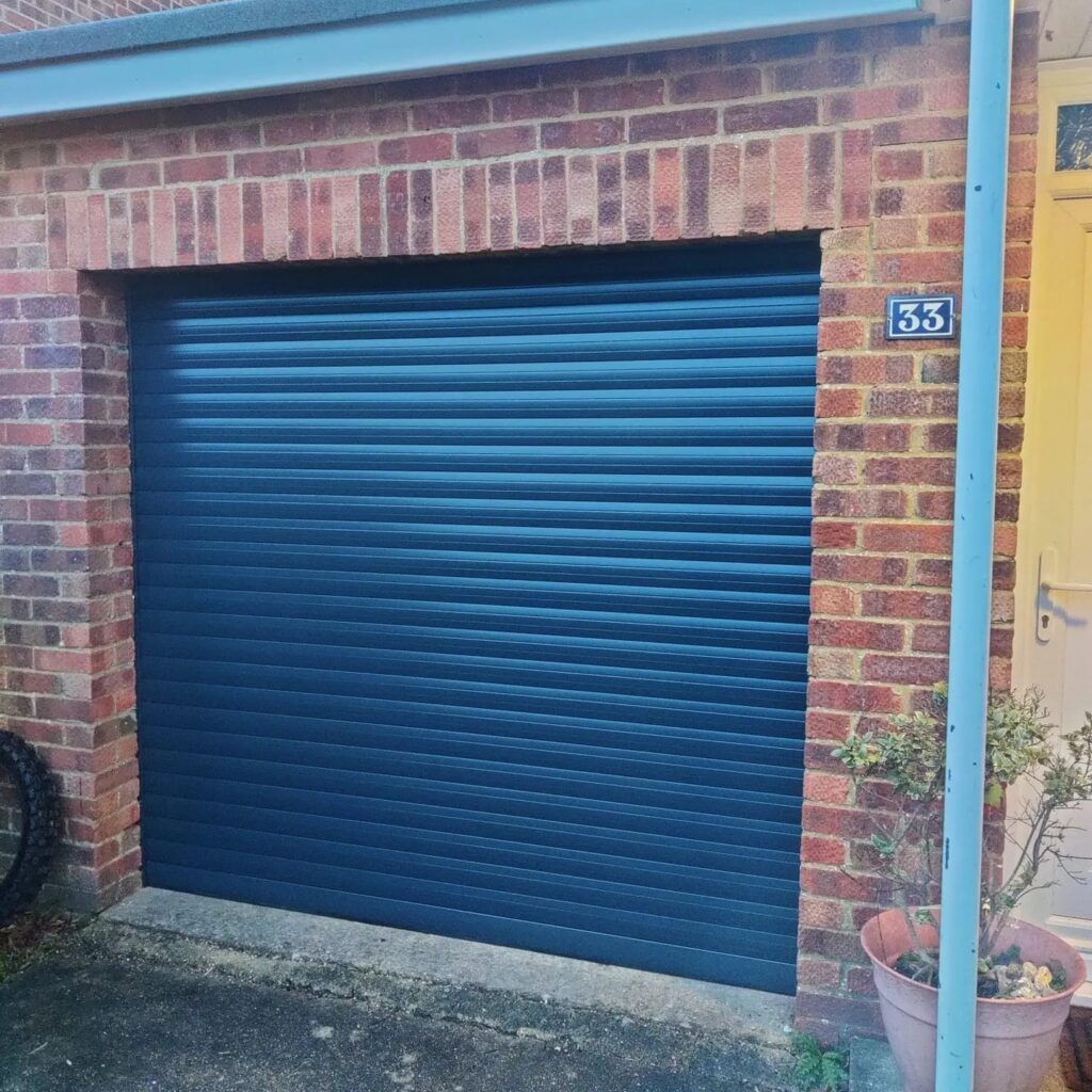 A roller garage door installed in the popular anthracite colour option.